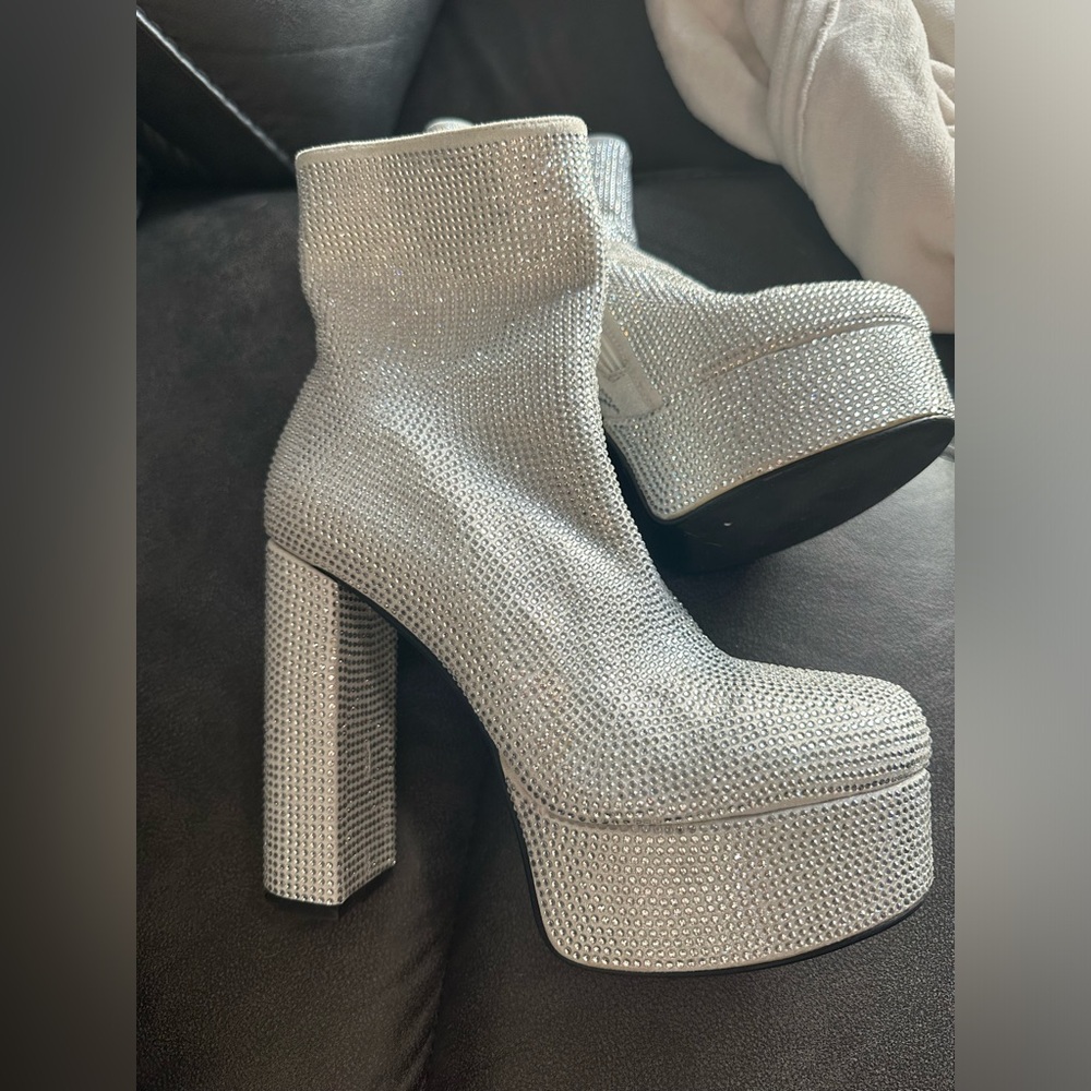 Rhinestone silver booties size 9. 6 inch heel.